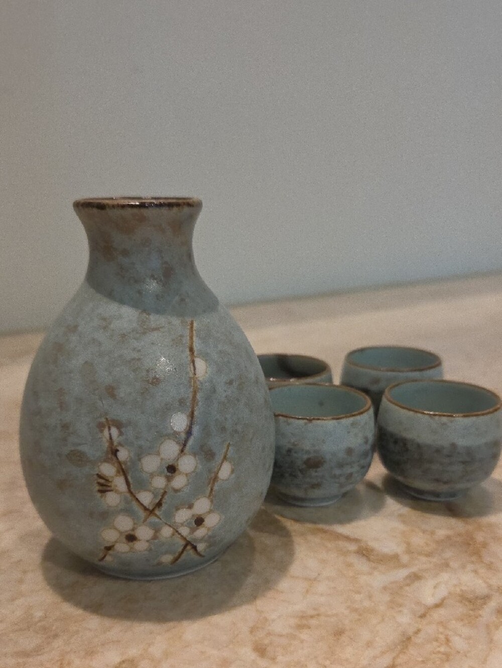 Hand-Glazed Light Blue Ceramic Sake Set with Blossom Motif